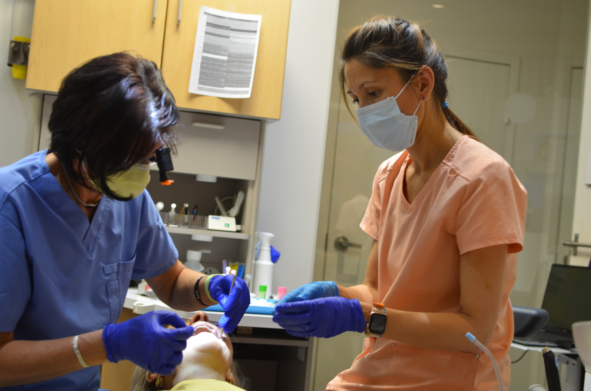 Dr. Flavia preparing instruments